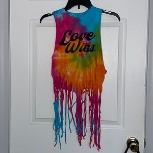 Never worn tie-dye muscle crop top with fringe. Says “love wins.”